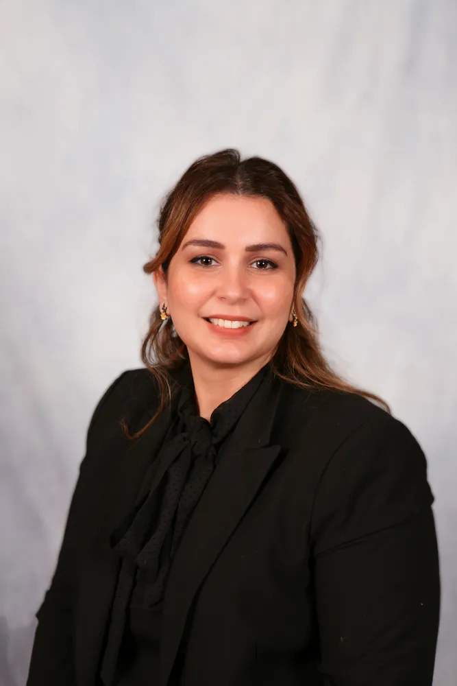 Dr. Amna Alwalie, DMD, MPH — dentist and founder of Denova Dental in Lombard